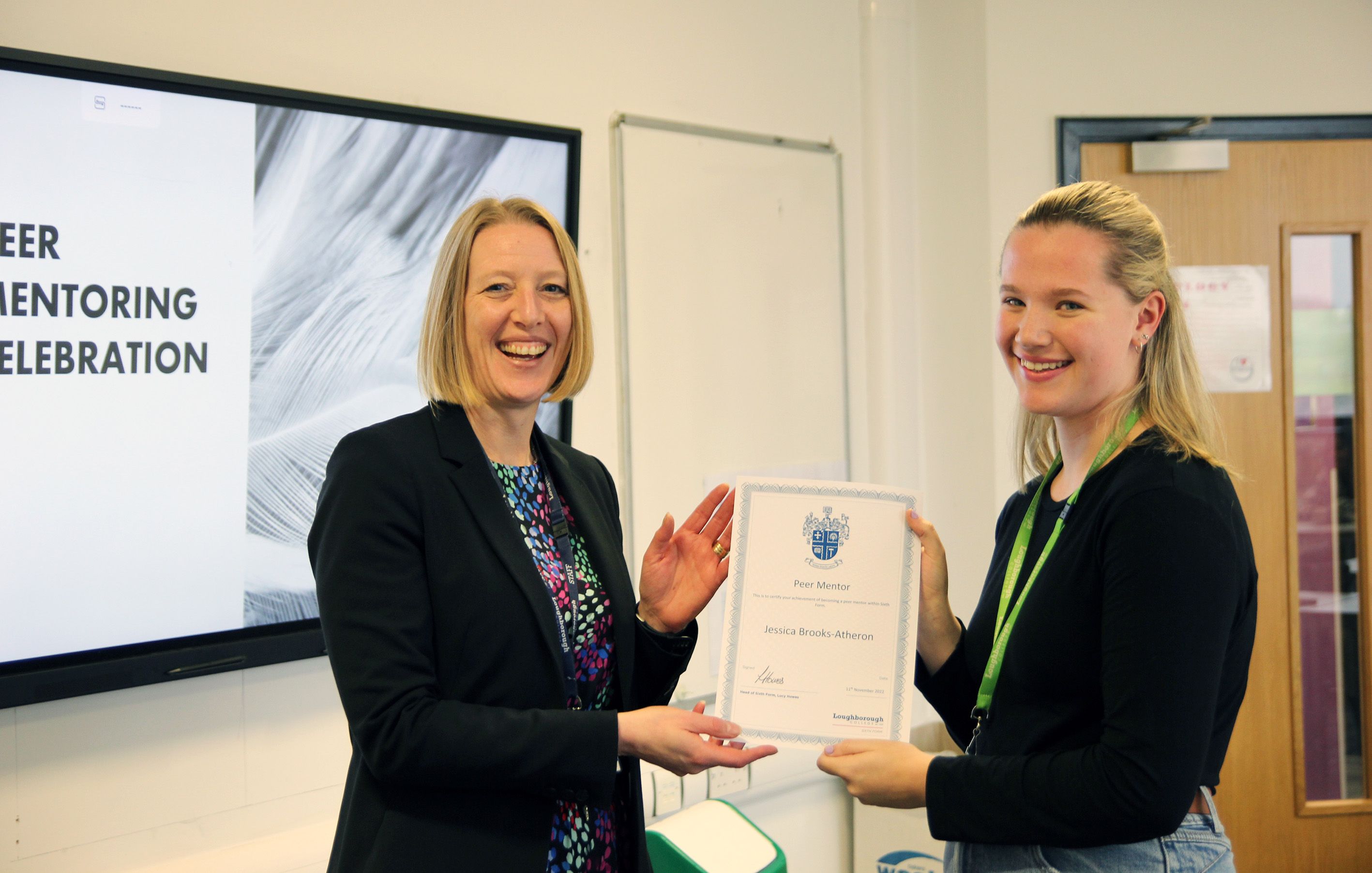 Jessica Brooks-Atherton A-Levels - Biology, Chemistry and Maths student receiving a mentor award form Lucy Howes