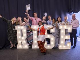 Staff celebrate at the RISE Awards