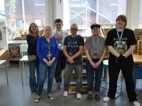 Staff and students at the plant and woodworking sale