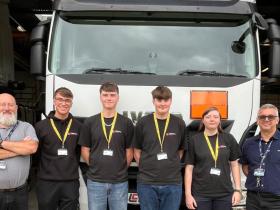 Staff and students in front of the HGV truck 