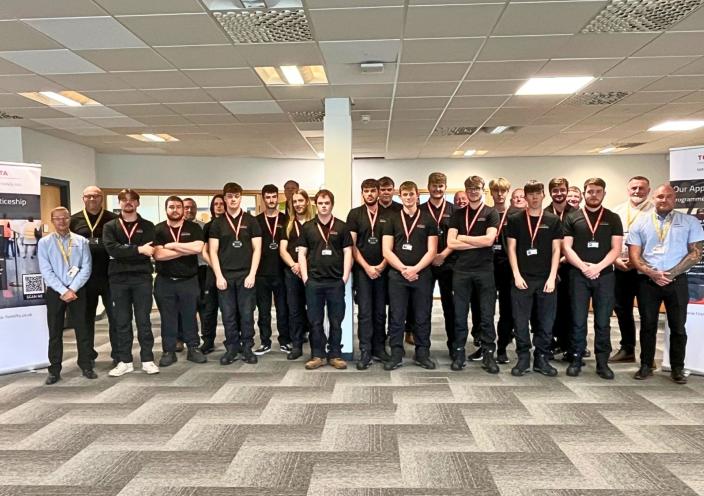 Toyota apprentices with staff
