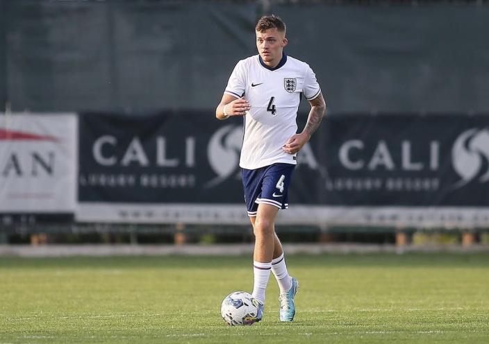 Harry Boorman playing football