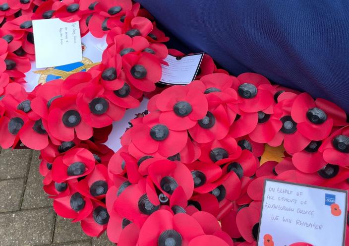 Two red poppy wreaths