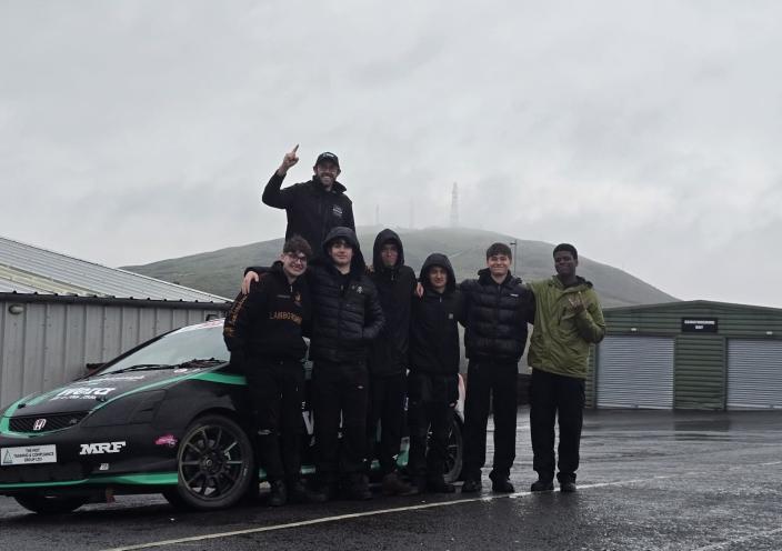 Motor Sport staff and students with the winning car