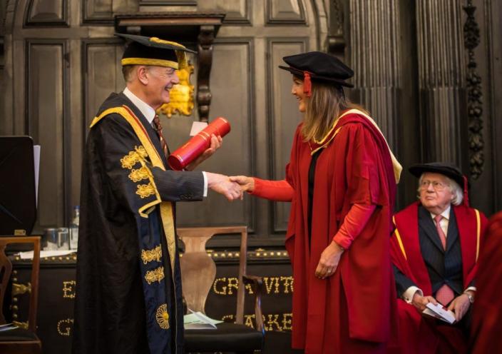 Corrie Harris receiving her CIFE fellowship