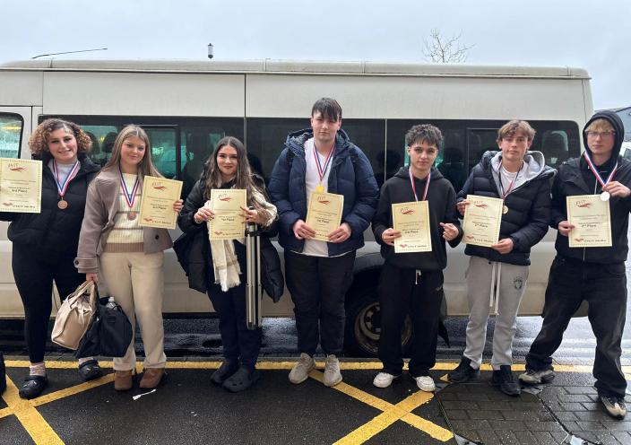 Students with their certificates