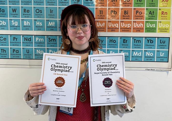 Bea with her certificates