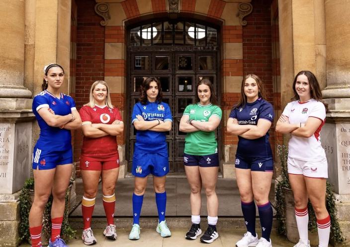 A group of women getting ready for their rugby match 