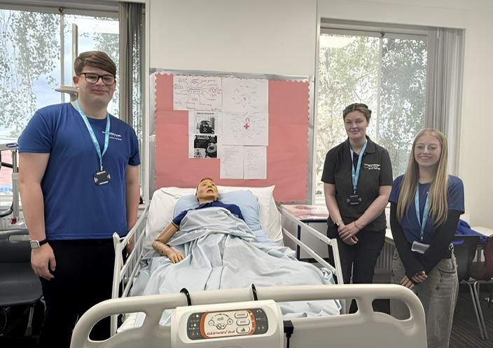 Jack, Teagen, and Lilly in the Heath and Social Care room