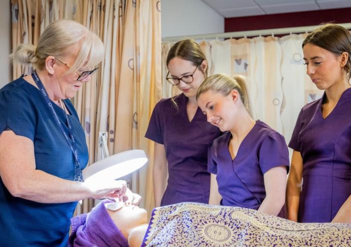 Beauty Therapy students at Stephenson College watch a demonstration
