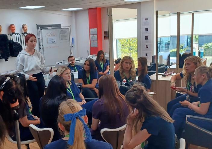 Tye-Jessica's demonstration in front of hairdressing students