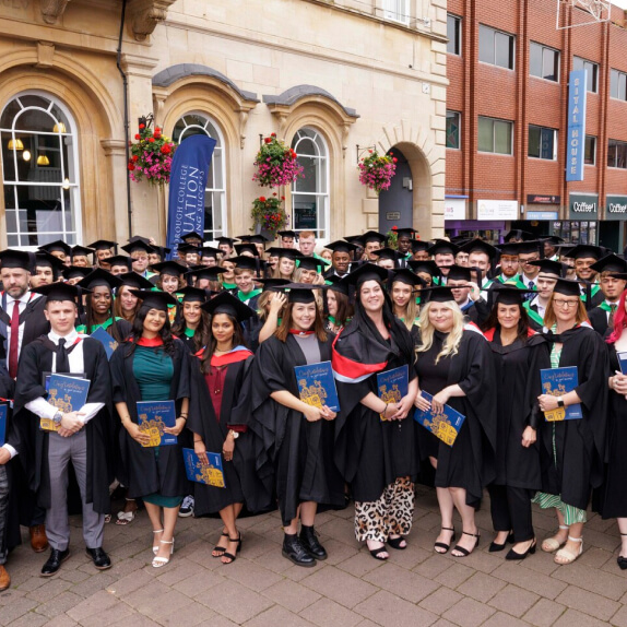 A group photo of HE Graduation Students outside Loughborough Town Hall