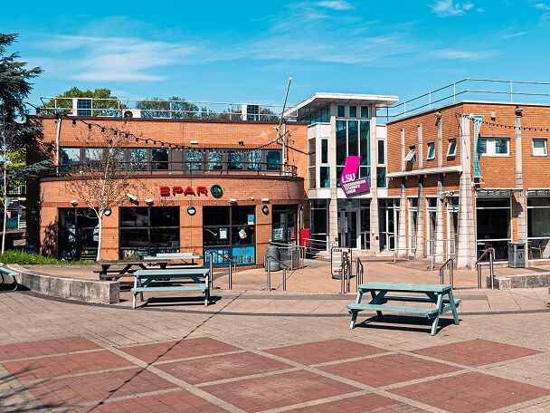 Exterior of the Loughborough Students Union building on sunny day with clear blue sky