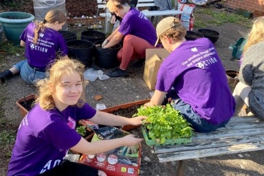 Engineering student looking at a cross section of a motor