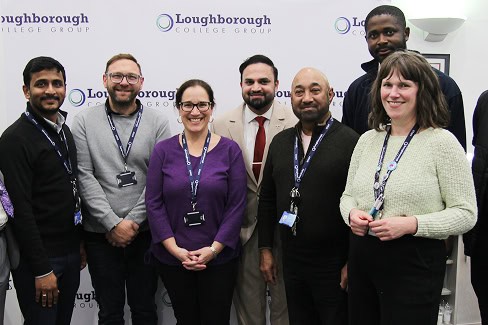 Group of Loughborough College Group staff standing together having their photograph taken after winning teaching award