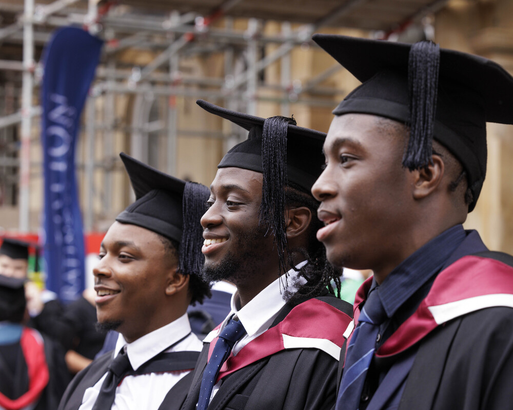 Students in graduation robes and caps