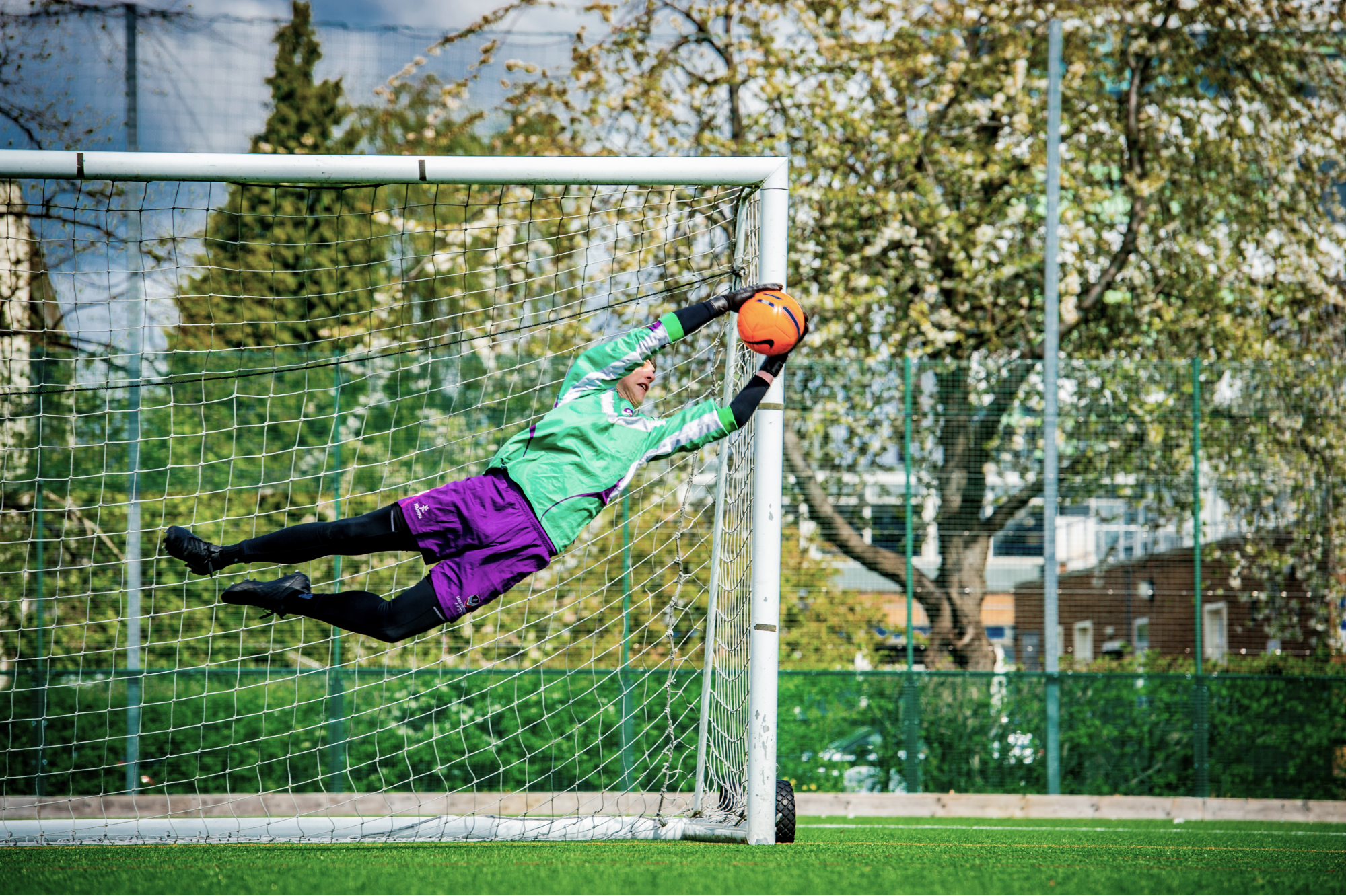 A goalkeeper making a save.
